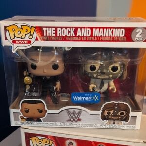 WWE The Rock and Mankind Vinyl Figures with Black and White Outfits